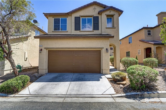 view of front of home featuring a garage