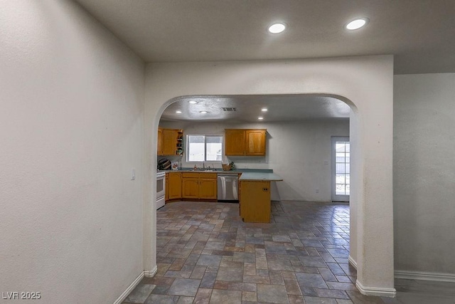 kitchen with stainless steel dishwasher, a center island, white electric range, and sink