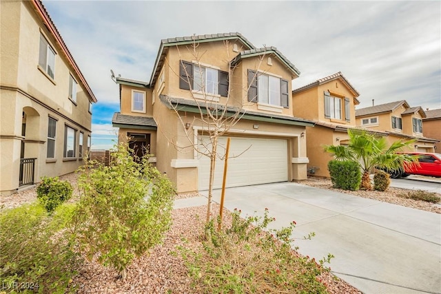 view of front of property with a garage