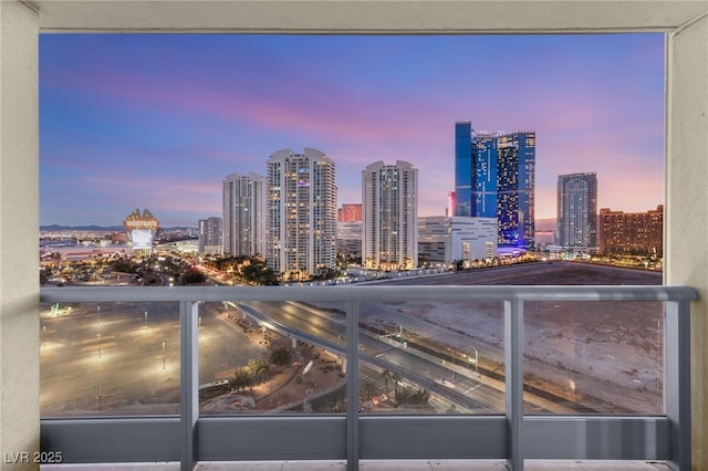 view of balcony at dusk