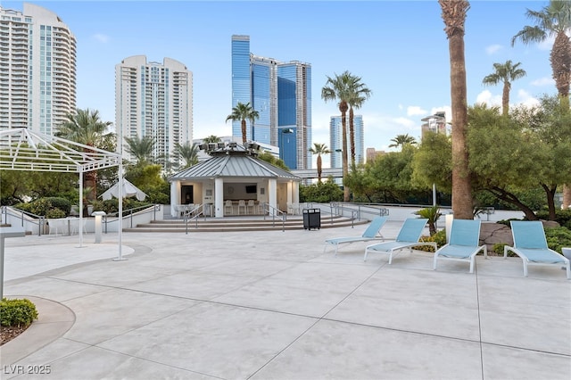 surrounding community with a gazebo and a patio