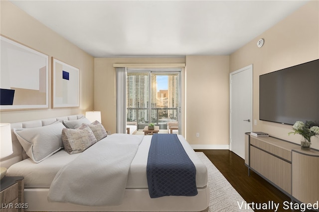 bedroom featuring dark hardwood / wood-style floors