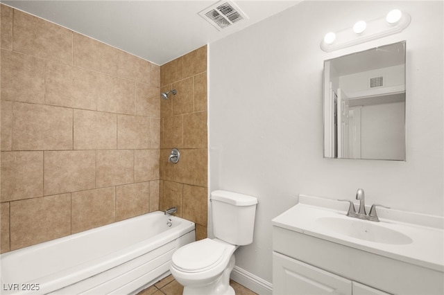 full bathroom featuring tile patterned flooring, vanity, toilet, and tiled shower / bath