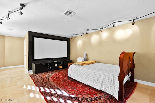 cinema room with tile patterned flooring