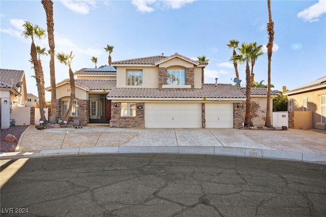 view of front of home with a garage