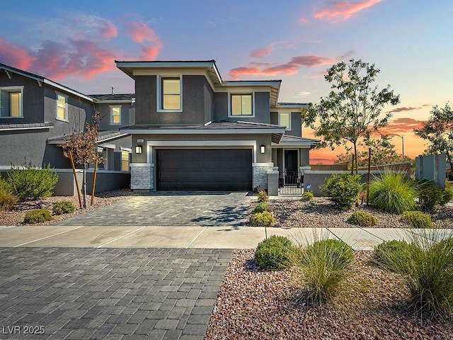 view of front of property featuring a garage