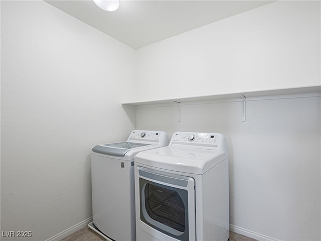 laundry area with separate washer and dryer