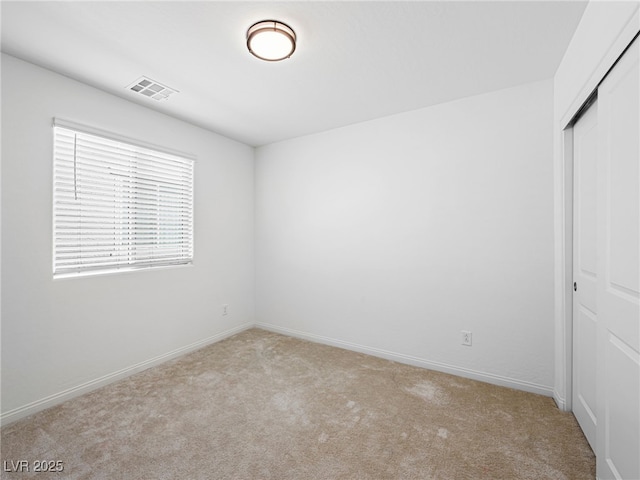 view of carpeted spare room