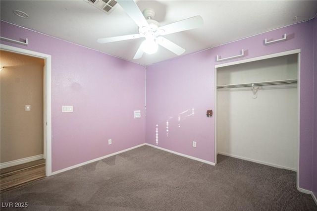 unfurnished bedroom with carpet flooring, ceiling fan, and a closet