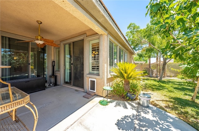 view of patio with ceiling fan