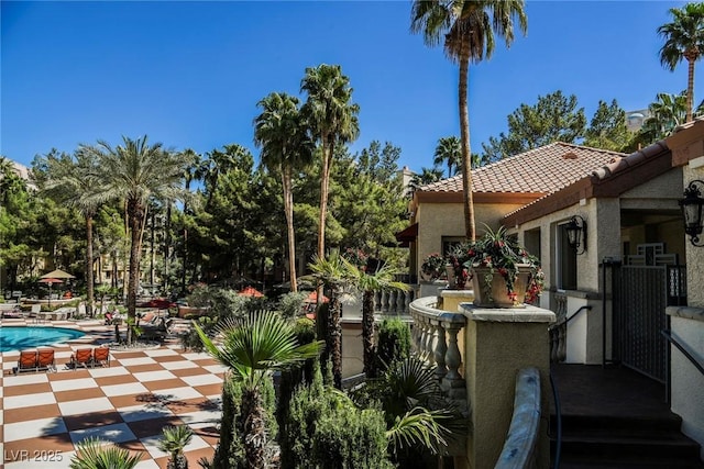 view of patio / terrace featuring an outdoor pool