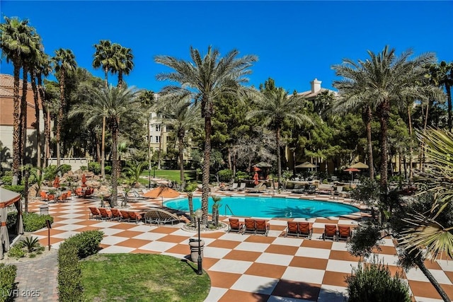 community pool featuring a patio area