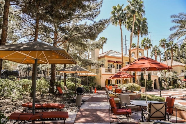 view of property's community with a patio