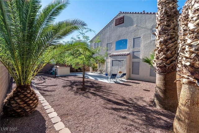 view of yard with a patio area