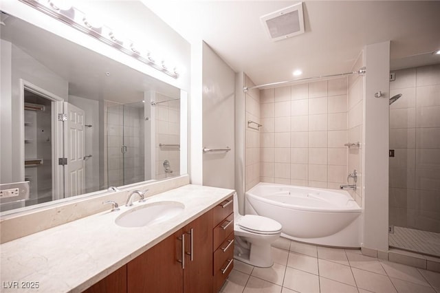 full bathroom featuring tile patterned floors, vanity, separate shower and tub, and toilet