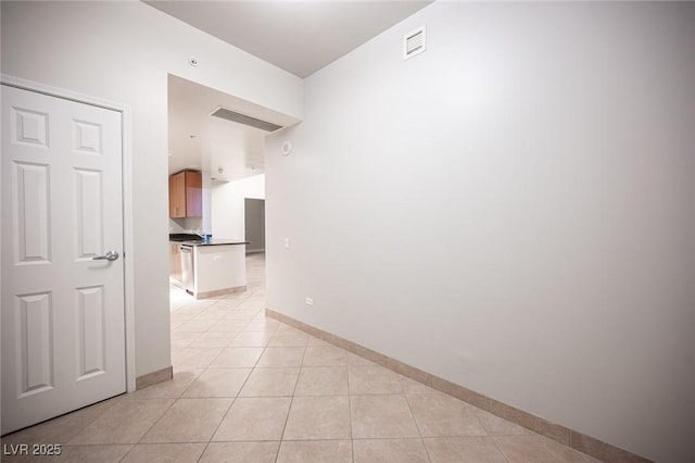 interior space with light tile patterned floors