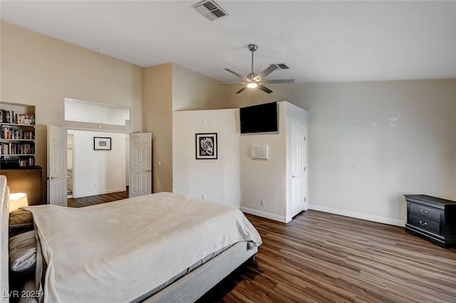 bedroom featuring dark hardwood / wood-style flooring, ceiling fan, and lofted ceiling