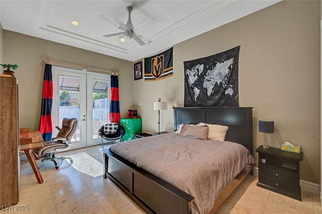 tiled bedroom featuring a raised ceiling, access to exterior, ceiling fan, and french doors