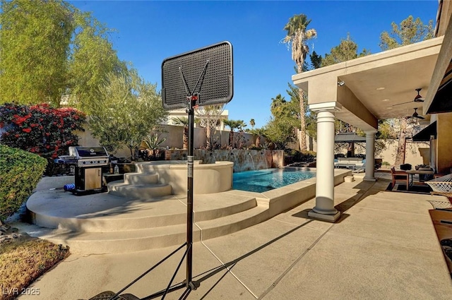 view of patio with grilling area and ceiling fan