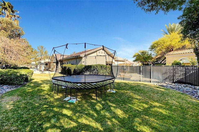 view of yard with a trampoline