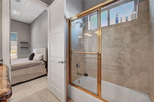 bathroom with tile patterned flooring and enclosed tub / shower combo