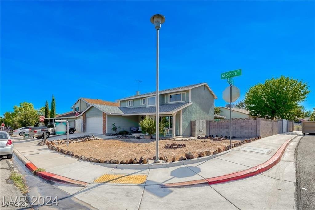 front of property featuring a garage