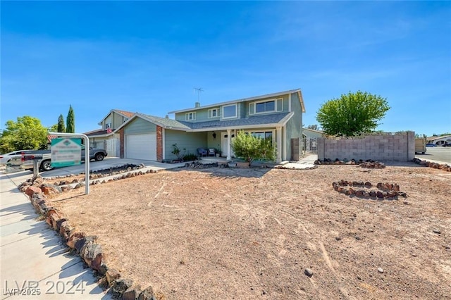 front of property featuring a garage