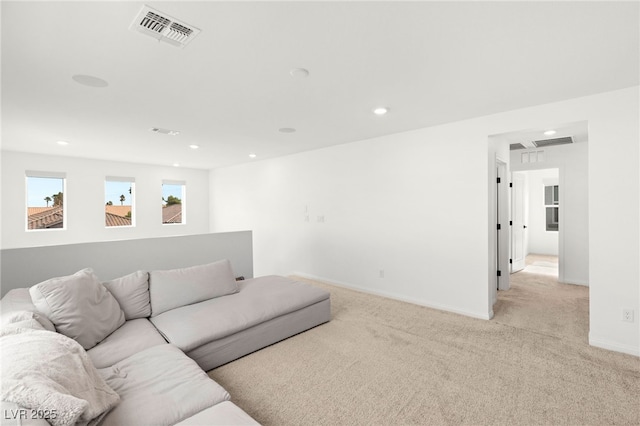 living room with light colored carpet