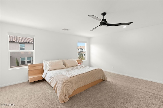 bedroom featuring ceiling fan and carpet floors