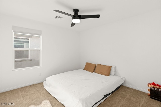 bedroom featuring carpet floors and ceiling fan