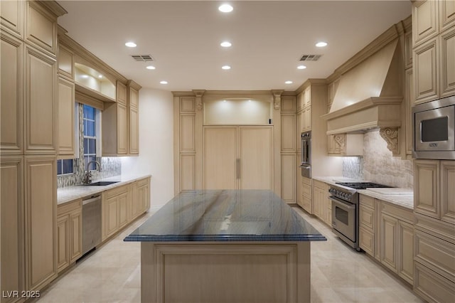 kitchen with decorative backsplash, a center island, stainless steel appliances, and custom exhaust hood