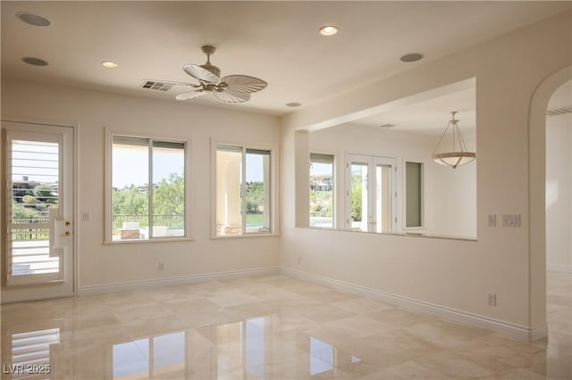 empty room featuring ceiling fan