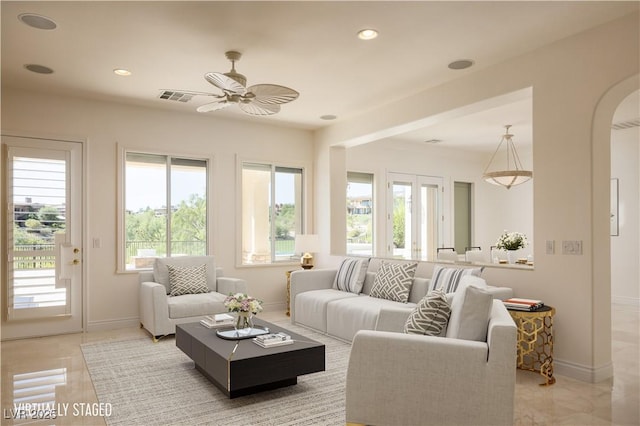 living room featuring ceiling fan