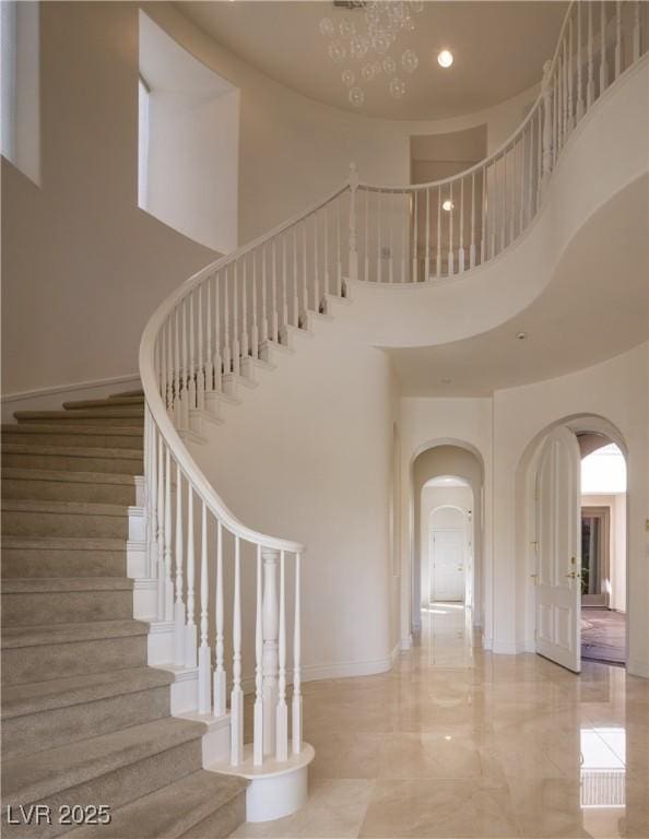 stairway with a high ceiling