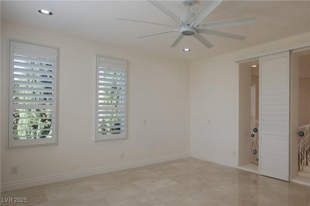 unfurnished room featuring ceiling fan