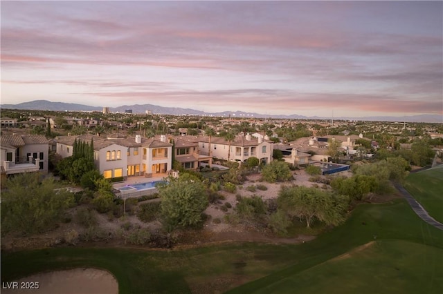 aerial view at dusk with a mountain view