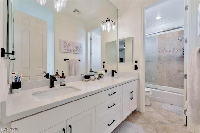 full bathroom with combined bath / shower with glass door, vanity, toilet, and ornamental molding