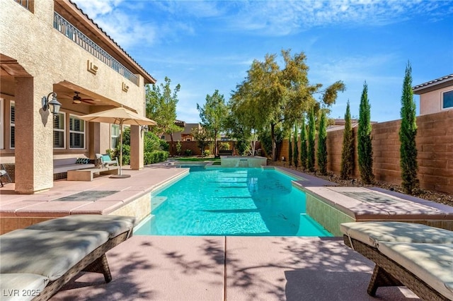 view of pool featuring ceiling fan and a patio area