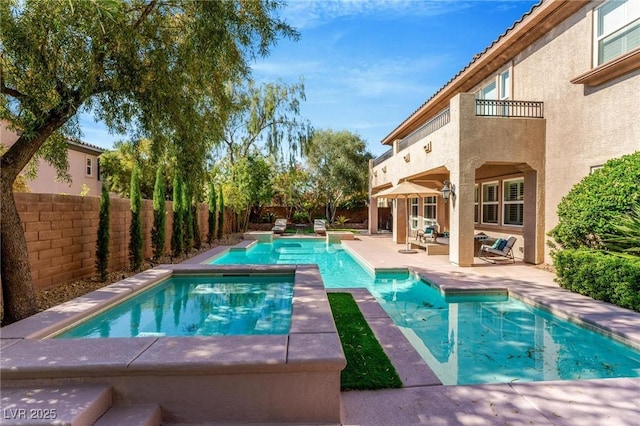 view of pool featuring an in ground hot tub, outdoor lounge area, and a patio area