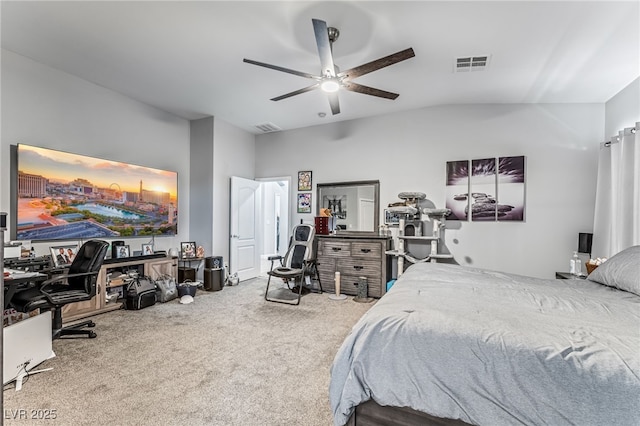 carpeted bedroom featuring ceiling fan and vaulted ceiling