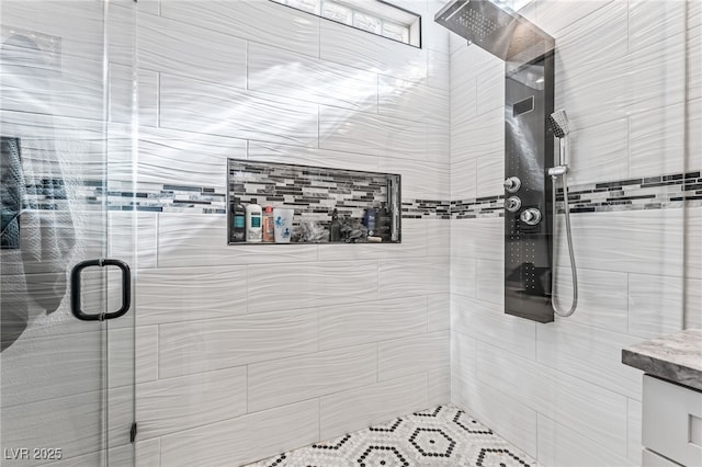 bathroom featuring an enclosed shower