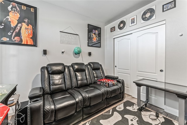 cinema room featuring light tile patterned floors