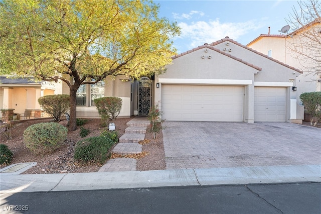 view of front of property featuring a garage