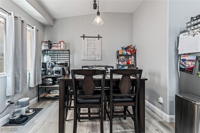 dining area featuring hardwood / wood-style floors