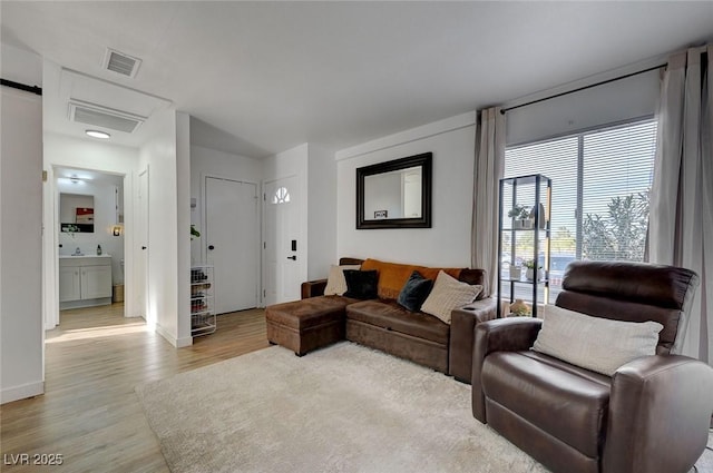 living room featuring light hardwood / wood-style flooring