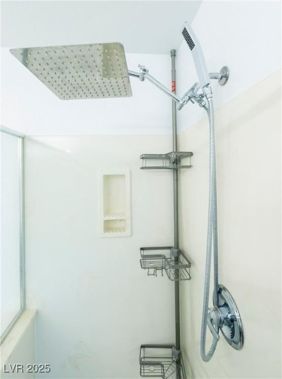 bathroom featuring walk in shower