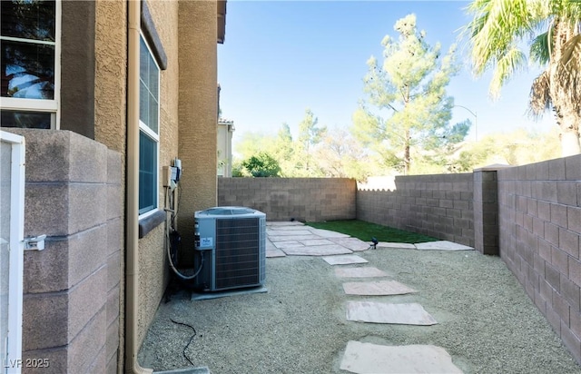 view of yard featuring central AC