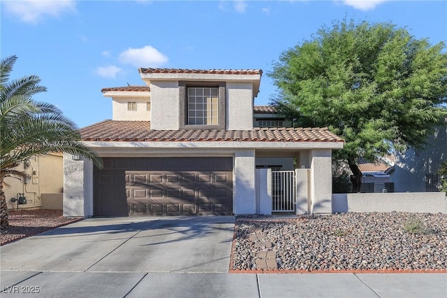 mediterranean / spanish-style home with a garage