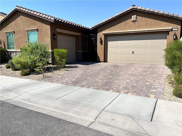 ranch-style house featuring a garage