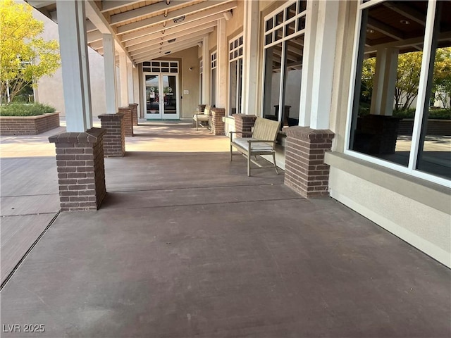 view of patio featuring french doors